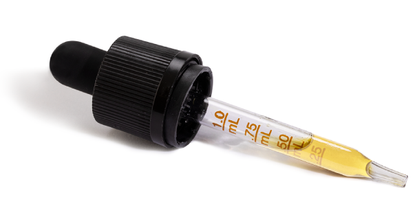 Image of pipette with .5 ml of Treatibles peanut flavored Organic Full Spectrum Hemp Oil for dogs