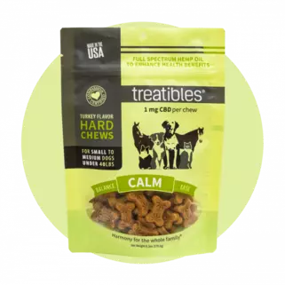 Green bag of Treatibles Calm (turkey) Hard Chews for small to medium dogs featuring Organic Full Spectrum Hemp CBD Oil