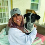 image of a woman with her dog.